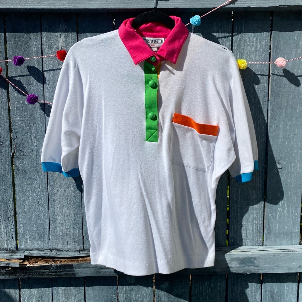 White & Multi-Colored Polo Shirt with a Retro Vibe